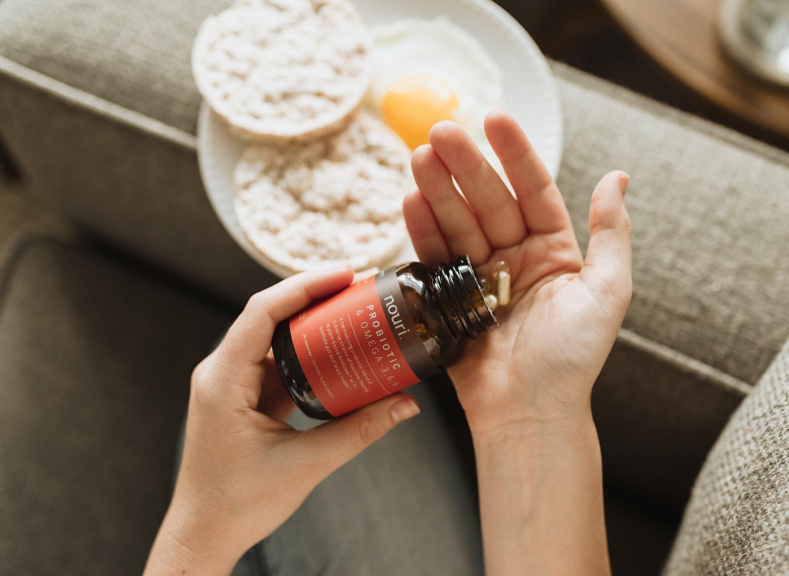 A woman holds a bottle of vitamin C in one hand and an egg in the other